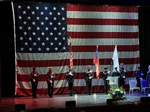 Veterans Day - Stage with Flag.jpg